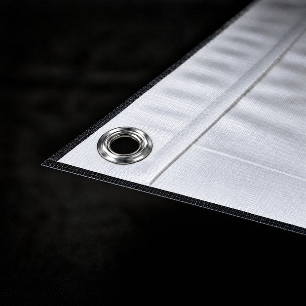 Close-up of a heat-welded hem folded along the edge of a banner